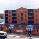 Architektura 2. poloviny 20. století a počátku 21. století: bývalá budova autobusového nádraží; foto O. Sepp 1998 .